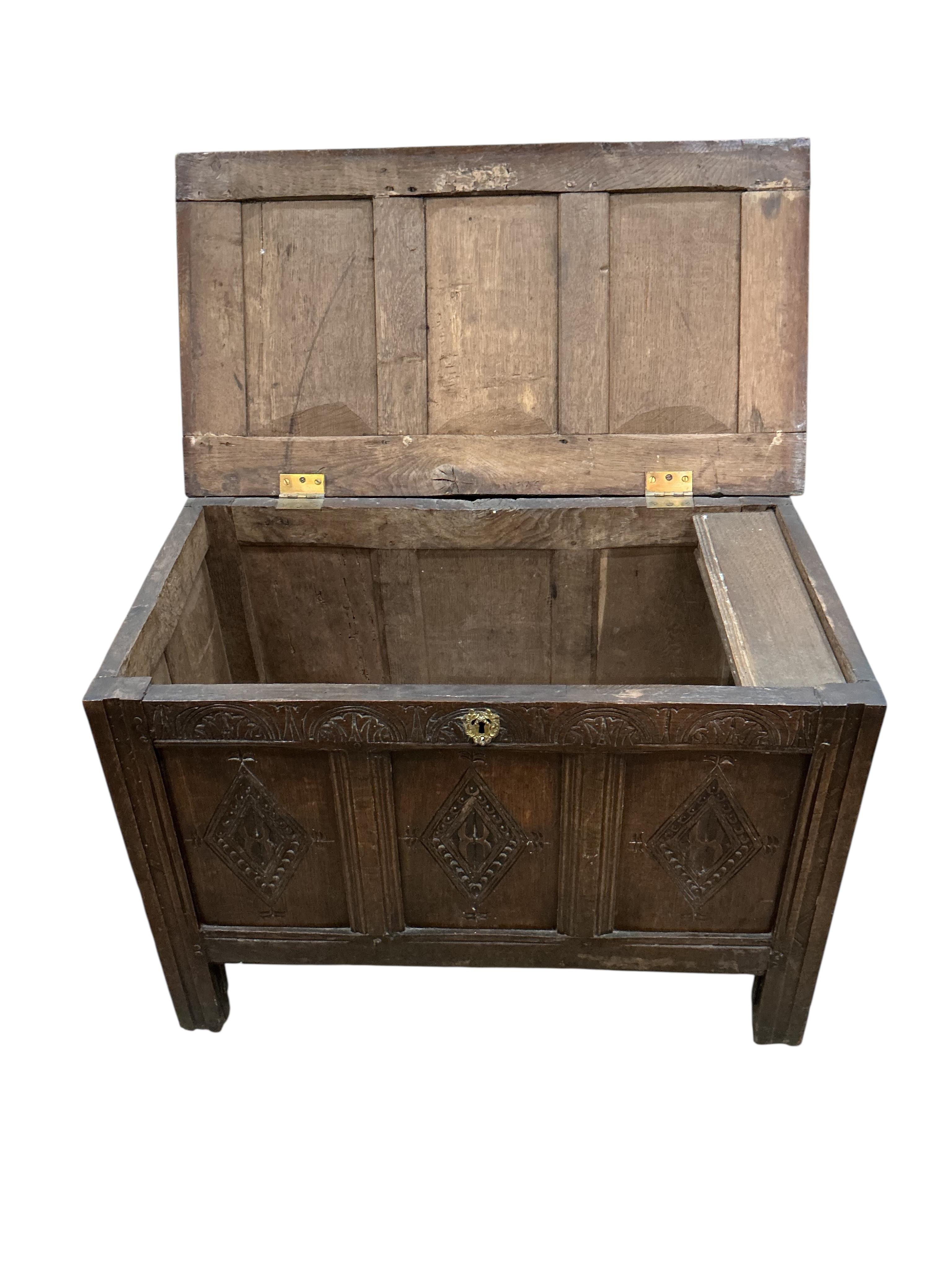 A small 17th century panelled oak coffer, width 87cm, depth 48cm, height 60cm